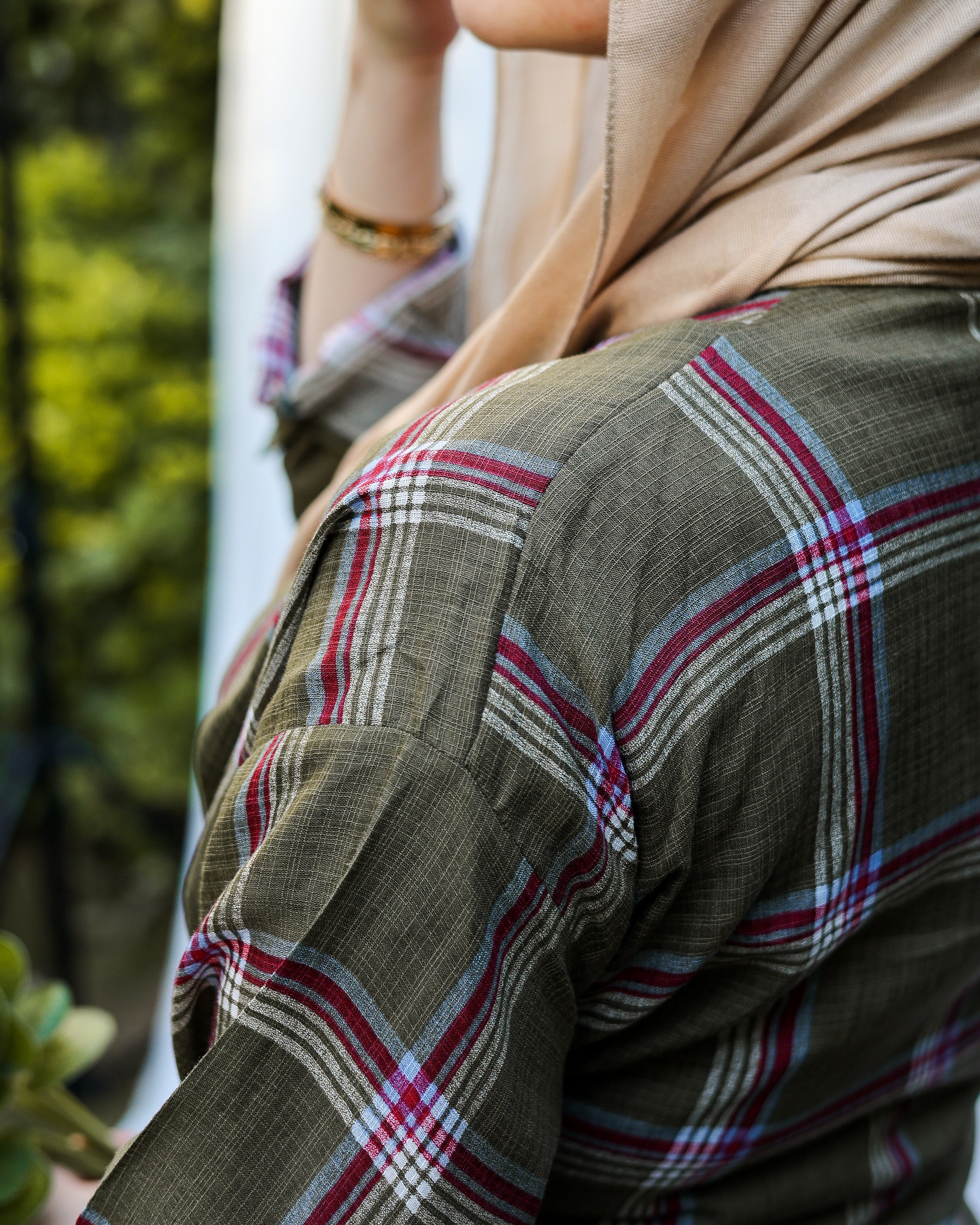 The olive tie shirt